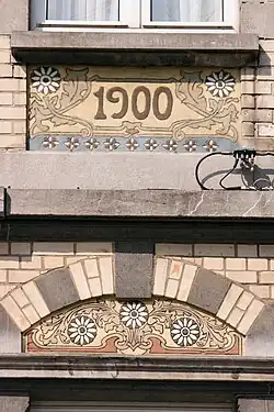 Art Nouveau sgraffito cartouche on Place Louis Morichar no. 10, Brussels, unknown artist, 1900[16]