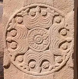 Motif based on triratnas.