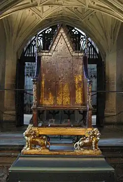 Front-view of the Coronation Chair, a wooden chair in Westminster Abbey used for the coronation of the English (and later British) monarch. There is a compartment at the bottom that is able to house the Stone of Scone, which originates from Scotland.