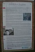 Bilingual information board about the castle