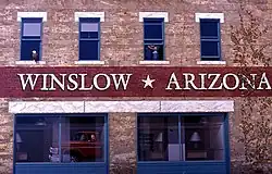 John Pugh's Slowin' Down to Take a Look mural, a tribute to the band the Eagles and the centerpiece of Standin' on the Corner Park in Winslow, AZ.