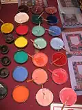 Pigment pots in the tent dedicated to Bhutanese traditional painting