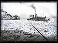 Steamboat John Trendley, of the Wiggins Ferry Company, caught on an icy river, possibly during the ice gorge of 1887