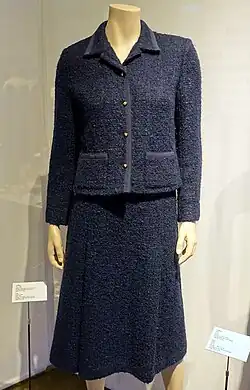 Navy-coloured tweed jacket and matching skirt