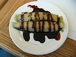 Sumang kamoteng kahoy (Cassava suman) smothered in latík