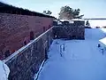 The fortress' northern curtaine and the main gate from bastion Qveckfelt. In the background is bastion Nordenskiöld.