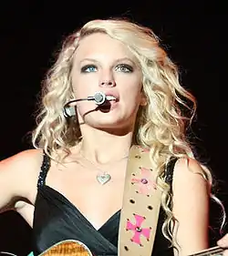 Image 58Taylor Swift rose to fame in the late 2000s, with her unique country-pop style, spawning global hits like "Love Story" and "You Belong with Me". (from 2000s in music)