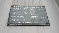 Information plate showing technical specifications of condenser unit