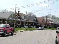 Street lined with houses with front porches