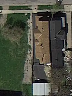 A satellite image of the house where the kidnappings happened. This image was taken in April 2012. This image was made before the house was demolished