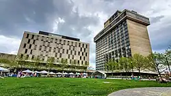 Cascade III and Akron City Center Hotel flank the grassy recreational area of the plaza.