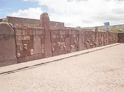 The walls of Semi-subterranean Temple are made up with sandstone columns and carved stone.