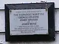 Plaque on wall of Tudor Cottage, Greensted Green, Essex, where three of the Martyrs lived on their return from transportation