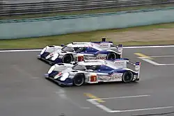 Identical cars, side by side