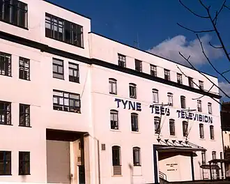A large building painted white
