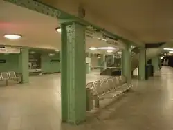 Station with pillars painted green