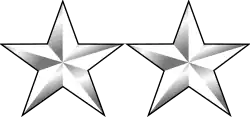 Two white metal stars in a horizontal row