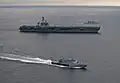 KD Kelantan (fore) with USS Carl Vinson and Kasturi-class corvette KD Lekir.