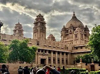 The Umaid Bhawan Palace at Jodhpur built between 1929 and 1942 is one of the largest royal palaces in the world. It was designed by Henry Vaughan Lanchester in a blend of Beaux-Arts and traditional Rajput styles