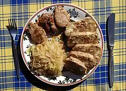 Vepřo knedlo zelo (pork roast with dumplings and sauerkraut), the Czech national dish