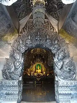 The interior of the Ubosot, seen through the entrance