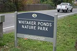 The sign for Whitaker Ponds Nature Park