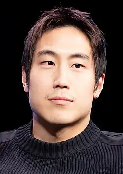 Young Mazino smirking