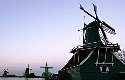 Typical Dutch windmills at sunset, Zaanse Schans