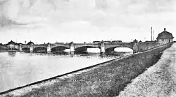 Around 1935 with the bridge houses
