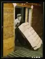 "Loading oranges into refrigerator car at a co-op orange packing plant," March 1943.